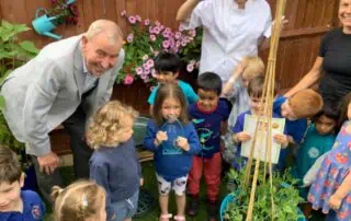 jim butress with children at monkey puzzle bromley