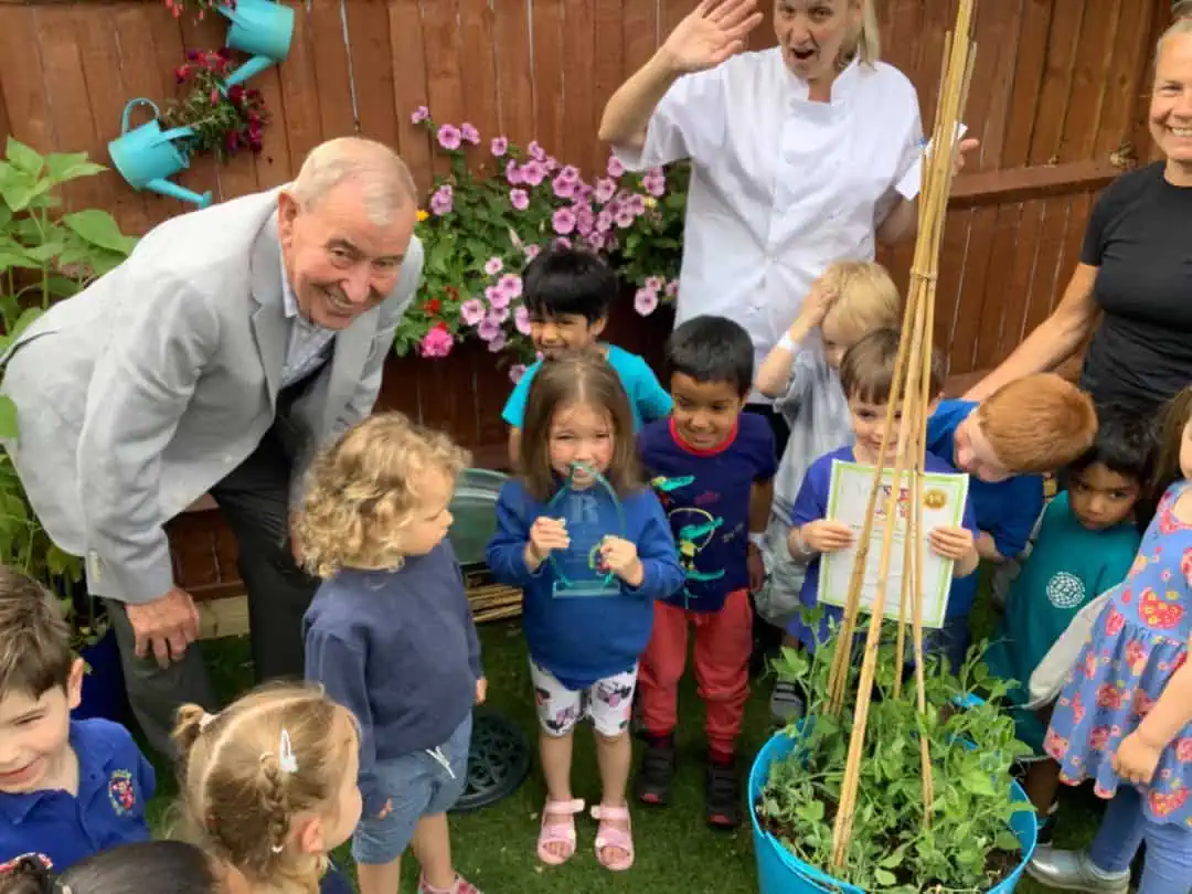 jim butress with children at monkey puzzle bromley